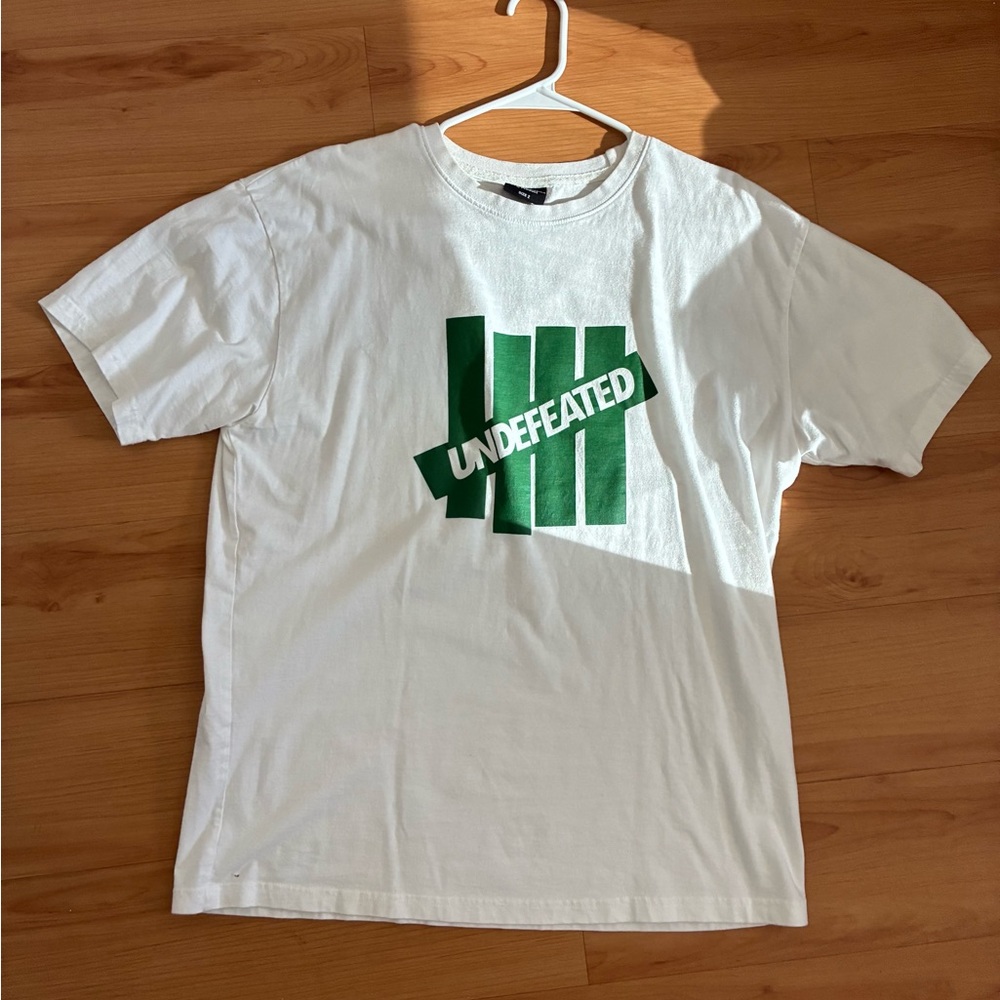 Undefeated White Tee with Green Logo